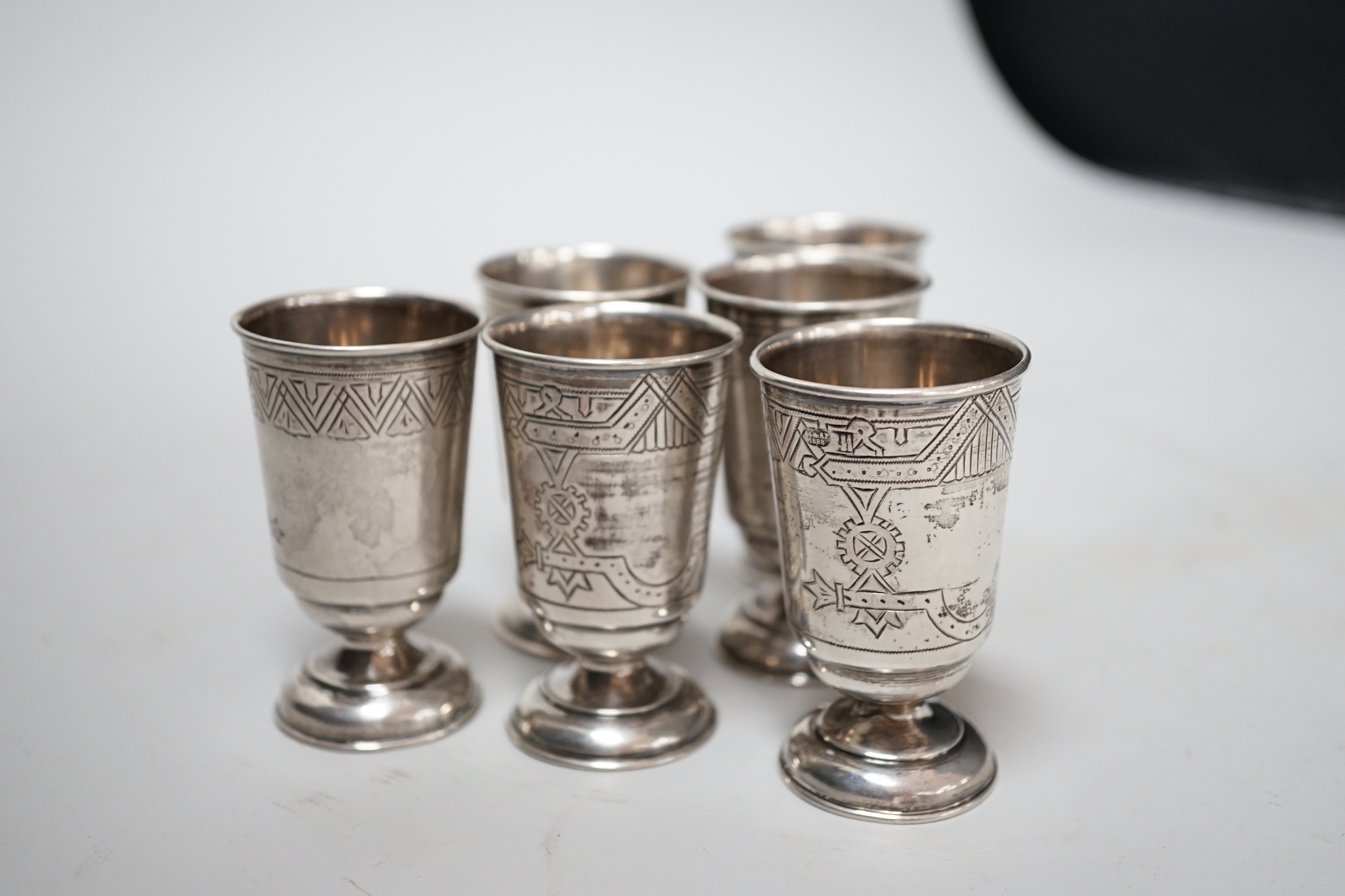 A set of six late 19th century Russian 84 zolotnik white metal pedestal tots, 65mm, 6.1oz.